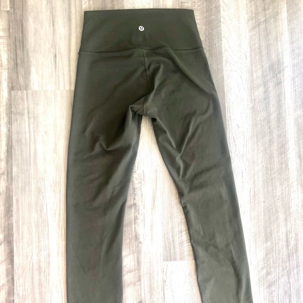Used Lululemon Wunder Under Leggings, 25”, Size 4 in the color Dark Olive.